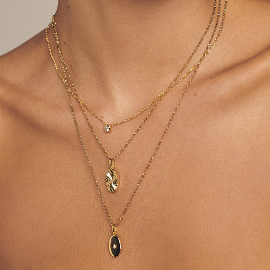 dainty gold crystal pendant necklace with a thin chain